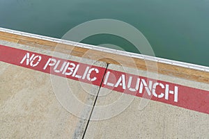 Painted signage on a concrete dock at Oceanside, California