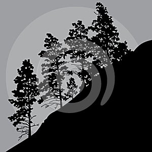 Painted silhouette of trees on a mountainside in a gray sky