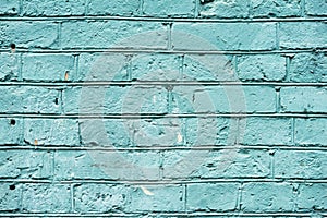 Painted turquoise vintage grunge brick wall texture urban background. Horizontal texture. For abstract background