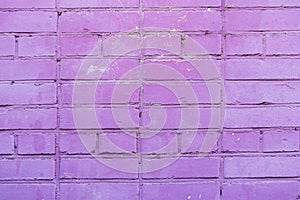 Painted violet brick wall, urban background, space for text. Horizontal texture. Abstract modern backdrop, pattern