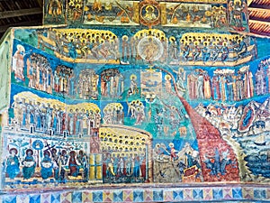 Painted wall at Voronet Monastery in Bucovina, Romania