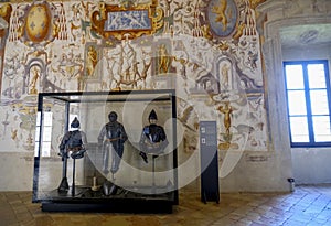 painted walls with knight's uniform exposition in the rooms of the Castle Torrechiara in Langhirano, Italy