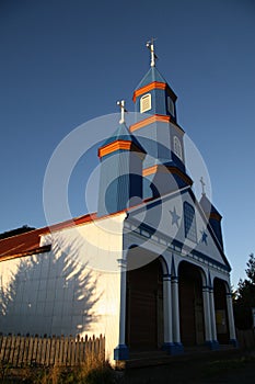 Painted wooden church in Chiloe photo