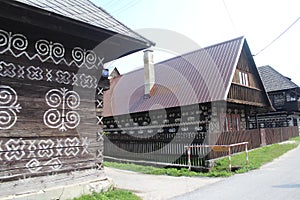 Painted wooden log houses in Cicmany, Slovakia