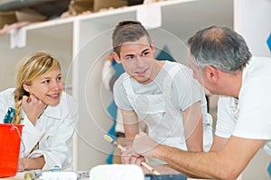 painter and decorator with apprentices