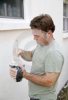 Painter Dipping Brush