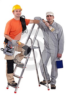 Painter and electrician by ladder