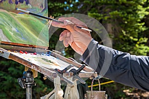 Painter Hand Brush and Easel photo