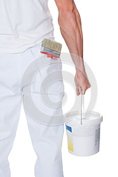 Painter Holding A Paint Roller And Bucket