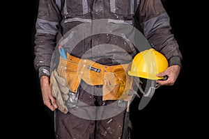 Painter holding a wall brush in his hand. Accessories for small home repairs