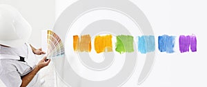 Painter man with color swatches in your hand, Choice colors photo