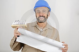 painter man holding banner