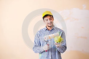 The painter man painting the wall at home