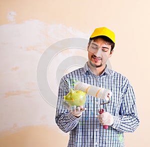 Painter man painting the wall at home