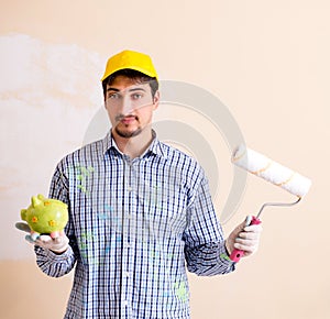 Painter man painting the wall at home