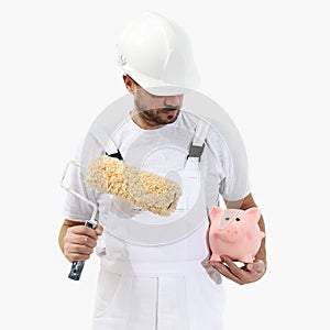 painter man with roller brush and piggy bank, isolated on white, saving concept