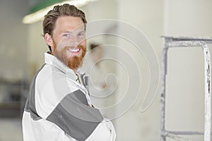 Painter man smiling at camera
