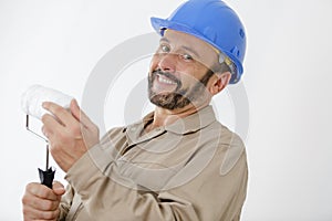painter man smiling with roller