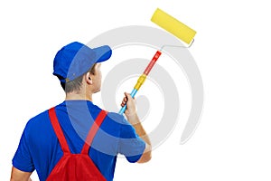 Painter man in uniform with paint roller