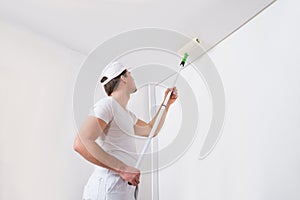 Painter Painting On Wall