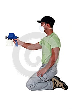 Painter using a spray gun.
