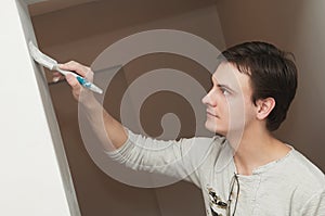 Painter worker decorator with brush