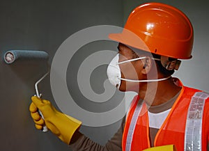 Painter worker wearing safety work on job