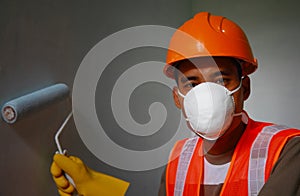 Painter worker wearing safety work on job