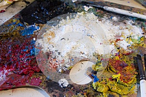 Painters preparing paint