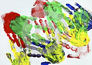 Painting with colorful kids hand prints.