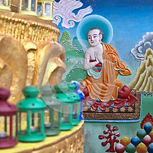 Painting at the foot of the large Buddha statue at Kagyu Yeunten Gyamtso Ling