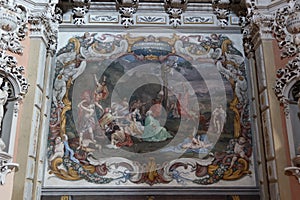 Painting on the left side wall of the Churrigueresque style Communion Chapel of Biar, Alicante, Spain photo