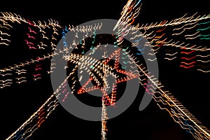 Painting with Light Star of Christmas in Night Illumination photo