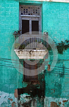 Painting made with acrylic paint based on a photo of a window in Cuba.