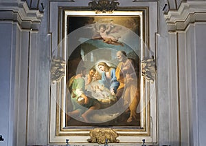 Painting of Mary and the Baby Jesus above an altar inside the Basilica Saint Maria in Trastevere