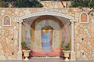 Painting mosaic on monastery walls. Agia Napa, Cyprus