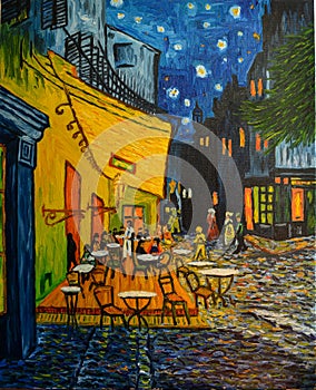 Painting oil on canvas. Free copy based on the famous painting by Vincent Van Gogh - Cafe Terrace on Forum Square, Arles, 1888 photo