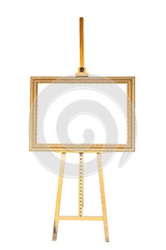 Painting stand wooden easel and empty antique golden frame isolated on white background