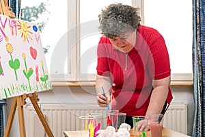 Painting Therapy with a mentally disabled woman