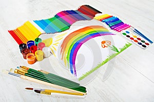 Painting tools, child drawing rainbow. Creativ