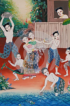 Painting of traditional water festival, symbol of Thai culture hobbies, Thai style painting on temple wall