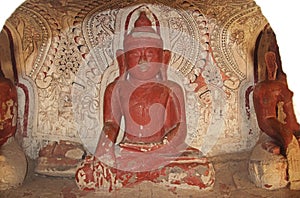 Painting on the walls and old Buddha statues in Pho Win Taung Caves, Monywa city, Sagaing State, Myanmar, Asia