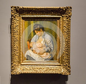 Painting of woman nursing child by Renoir