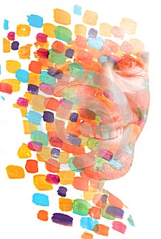 A paintography smiling man's portrait in double exposure