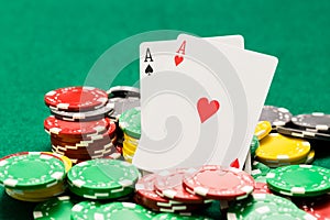 Pair of aces and OOF casino chips