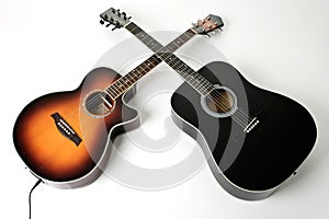 Pair of acoustic guitars photo
