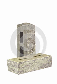 Pair of Aged Green and White Bricks With Rectangular Wholes for Construction Isolated