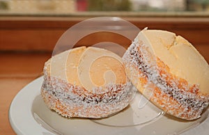 Pair of Alfajores, Traditional Latin American Filling Cookies on the Table