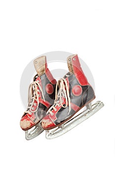 Pair of ancient ice skates, white background