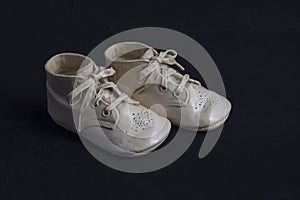 Porcelainized baby shoes photo